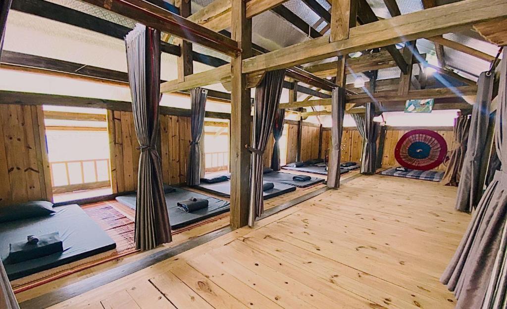 an inside view of a room with yoga mats at Nậm Lỳ Retreat- Breakfast included in Ha Giang
