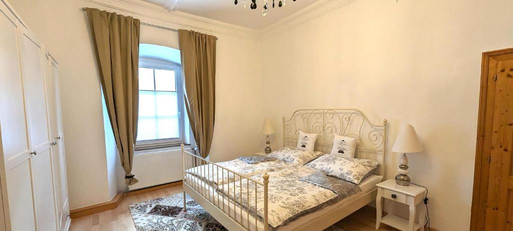 Postel nebo postele na pokoji v ubytování Ferienwohnung Elsasser