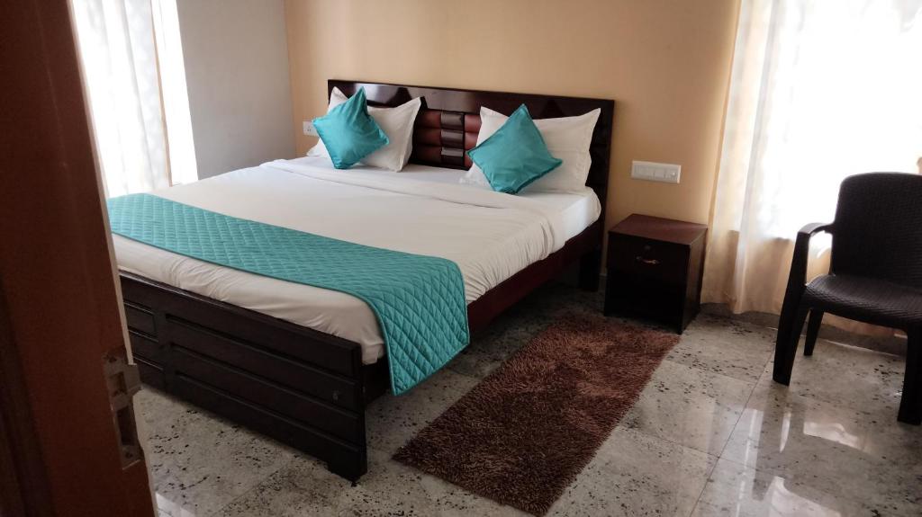 Ένα ή περισσότερα κρεβάτια σε δωμάτιο στο S V HOME STAY