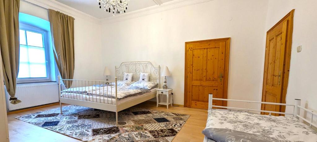 Postel nebo postele na pokoji v ubytování Ferienwohnung Elsasser