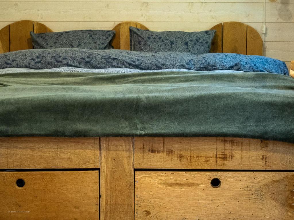 Postel nebo postele na pokoji v ubytování La Tiny House de la Bergerie