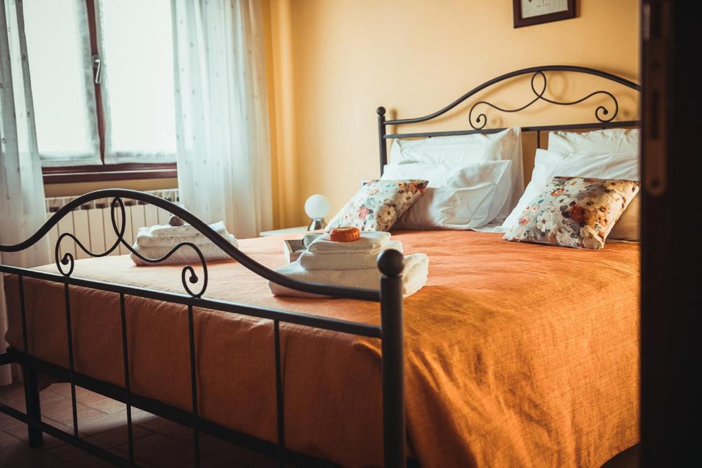 Postel nebo postele na pokoji v ubytování Casa Lidia Gavi