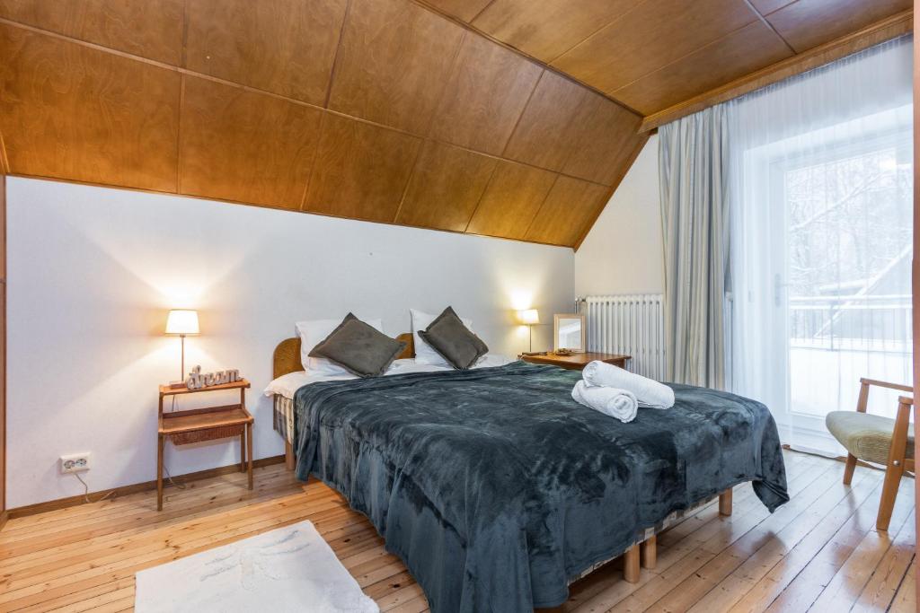 Postel nebo postele na pokoji v ubytování Kadriorg by Rikas Hotels