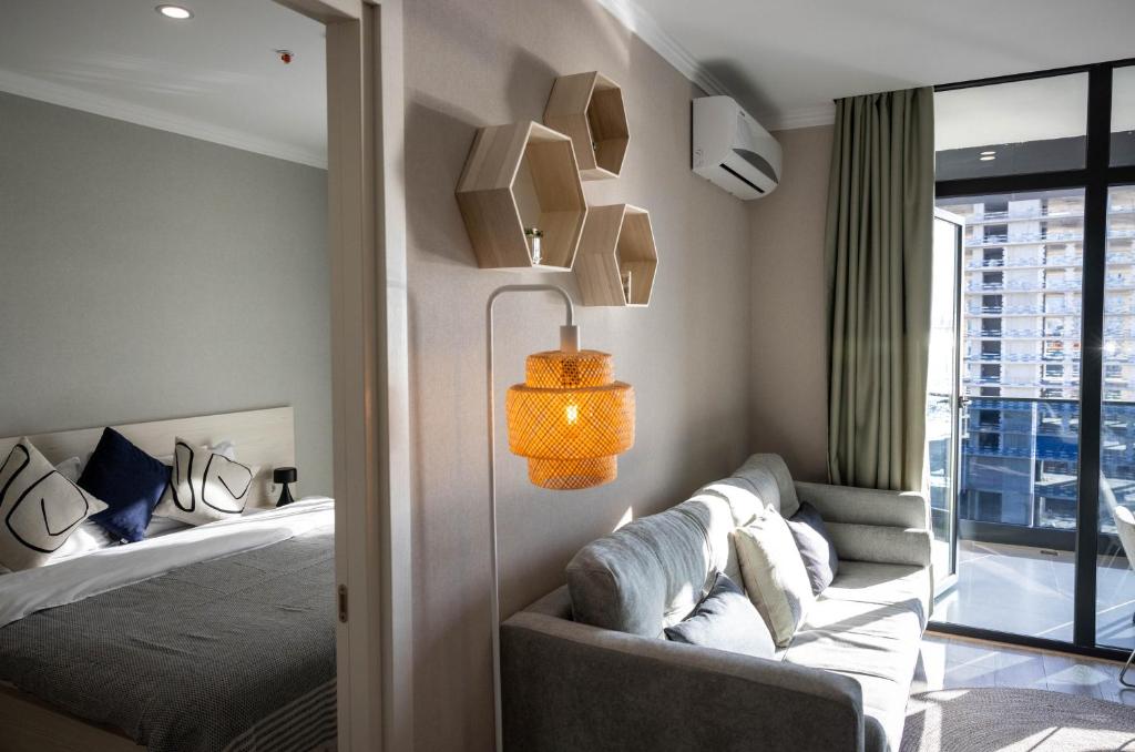 Postel nebo postele na pokoji v ubytování Green Side Apart Hotel