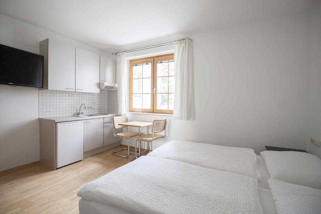 A bed or beds in a room at Appartements Christophorus