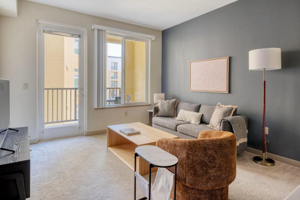 a living room with a couch and a table at Dublin 2br w pool ac nr shopping groceries SFO-1482 in Dublin