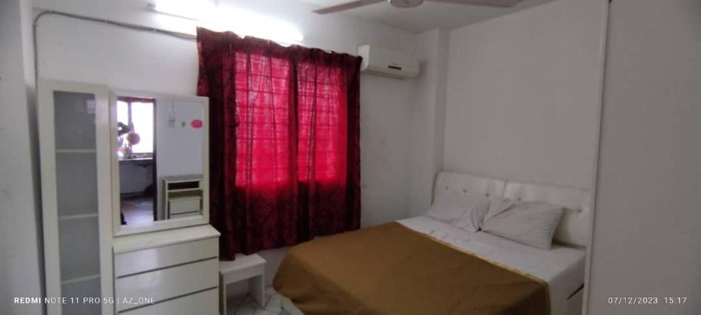 Ein Bett oder Betten in einem Zimmer der Unterkunft My Homestay Pangsapuri sutera