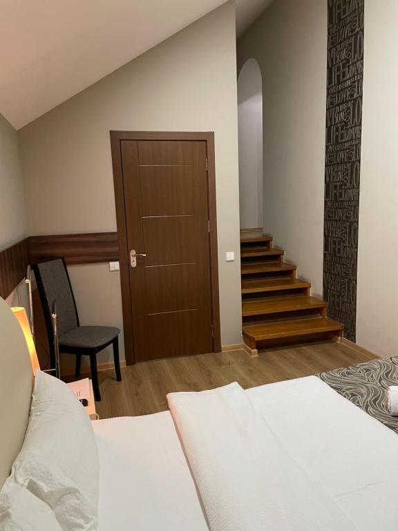 Postel nebo postele na pokoji v ubytování New Hotel