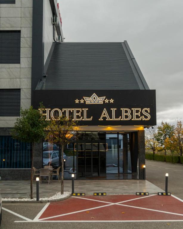a hotel alliance sign in front of a building at HOTEL ALBES in Prizren
