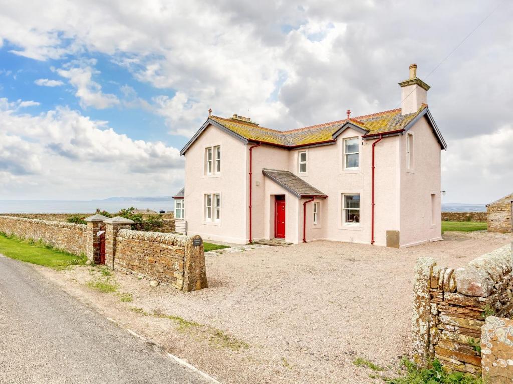 a house on the side of a road at 3 Bed in John O Groats CA337 in Mey