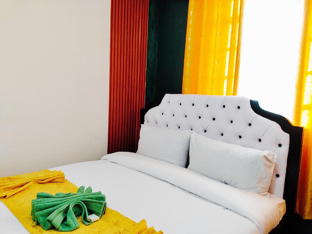 Postel nebo postele na pokoji v ubytování Nanyuki Cozy Haven