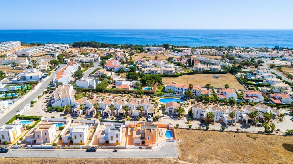 an aerial view of a resort near the ocean at Villa alhabu in Albufeira