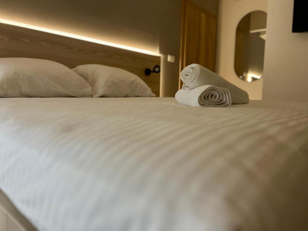 Postel nebo postele na pokoji v ubytování Borsa Rooms