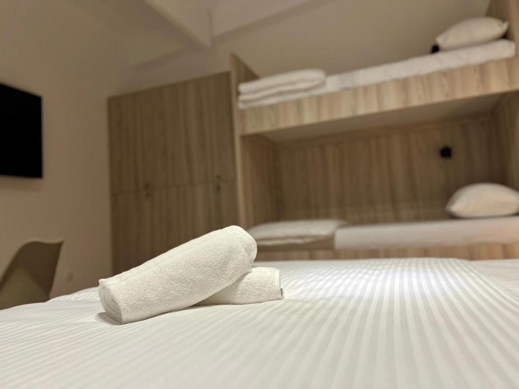 Postel nebo postele na pokoji v ubytování Borsa Rooms