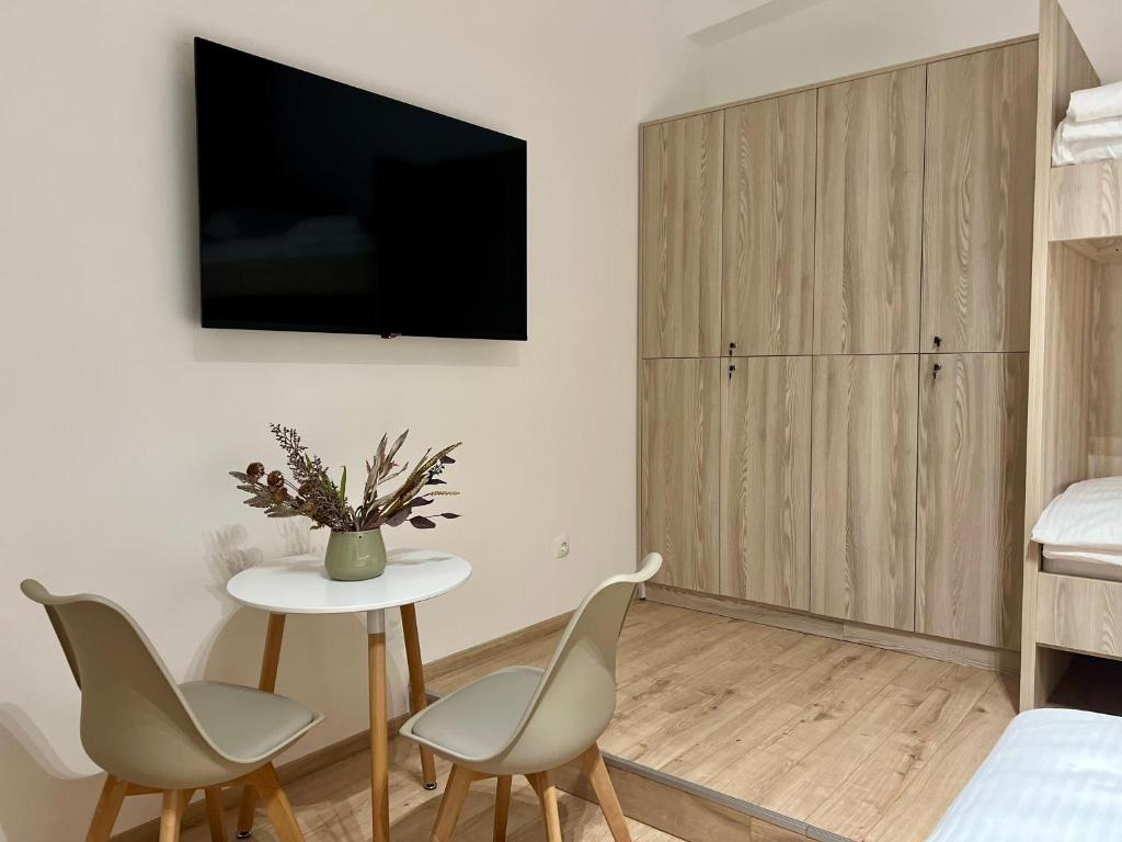 Postel nebo postele na pokoji v ubytování Borsa Rooms