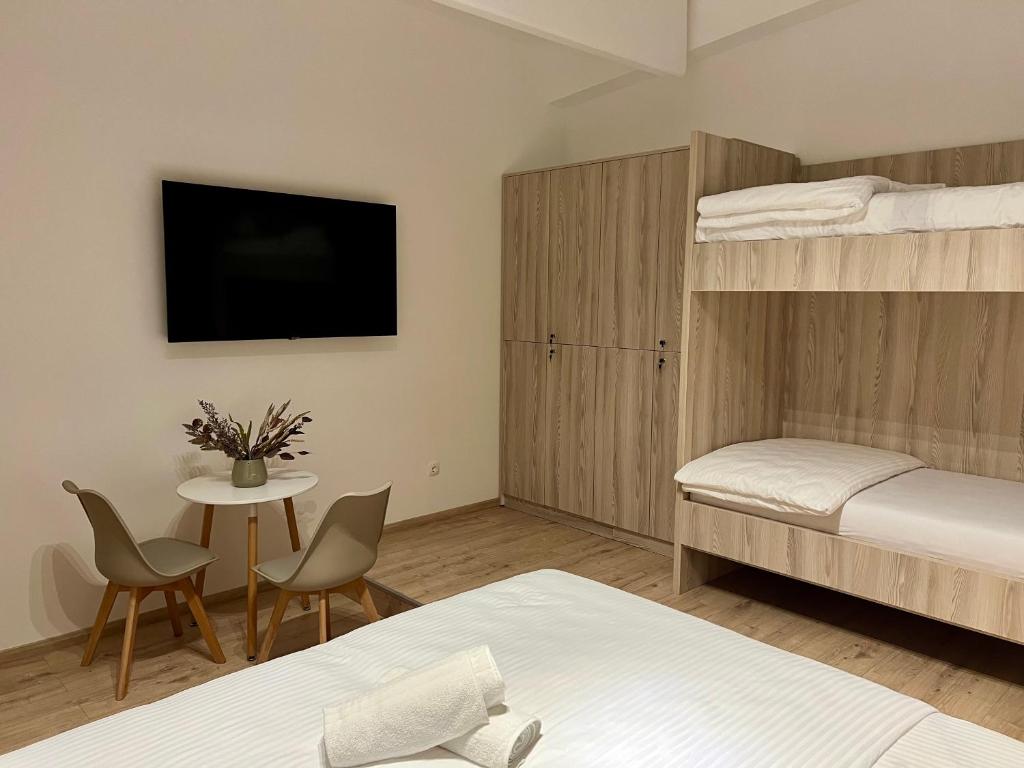 Postel nebo postele na pokoji v ubytování Borsa Rooms