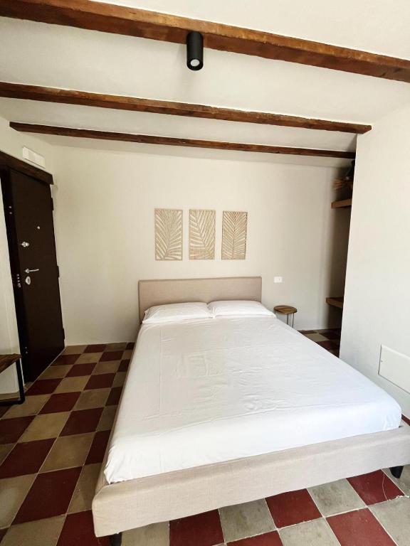 Postel nebo postele na pokoji v ubytování La Casetta b & b