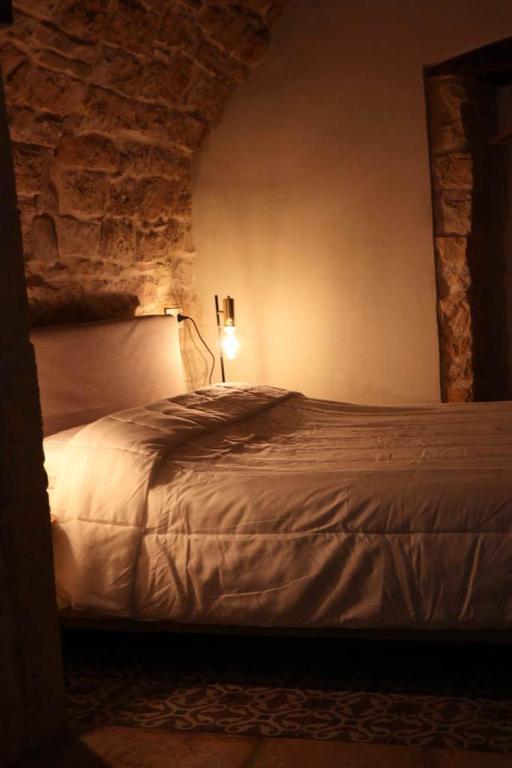 Postel nebo postele na pokoji v ubytování La Casetta b & b