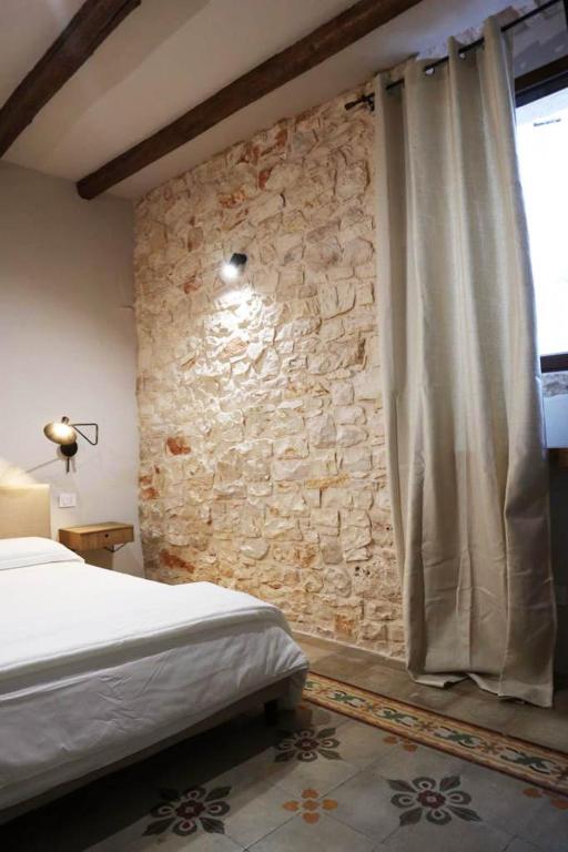 Postel nebo postele na pokoji v ubytování La Casetta b & b