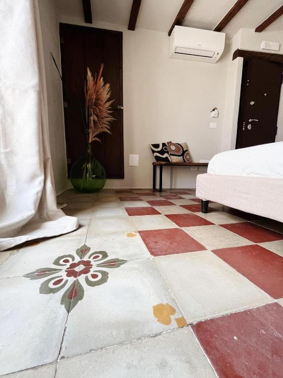 Postel nebo postele na pokoji v ubytování La Casetta b & b