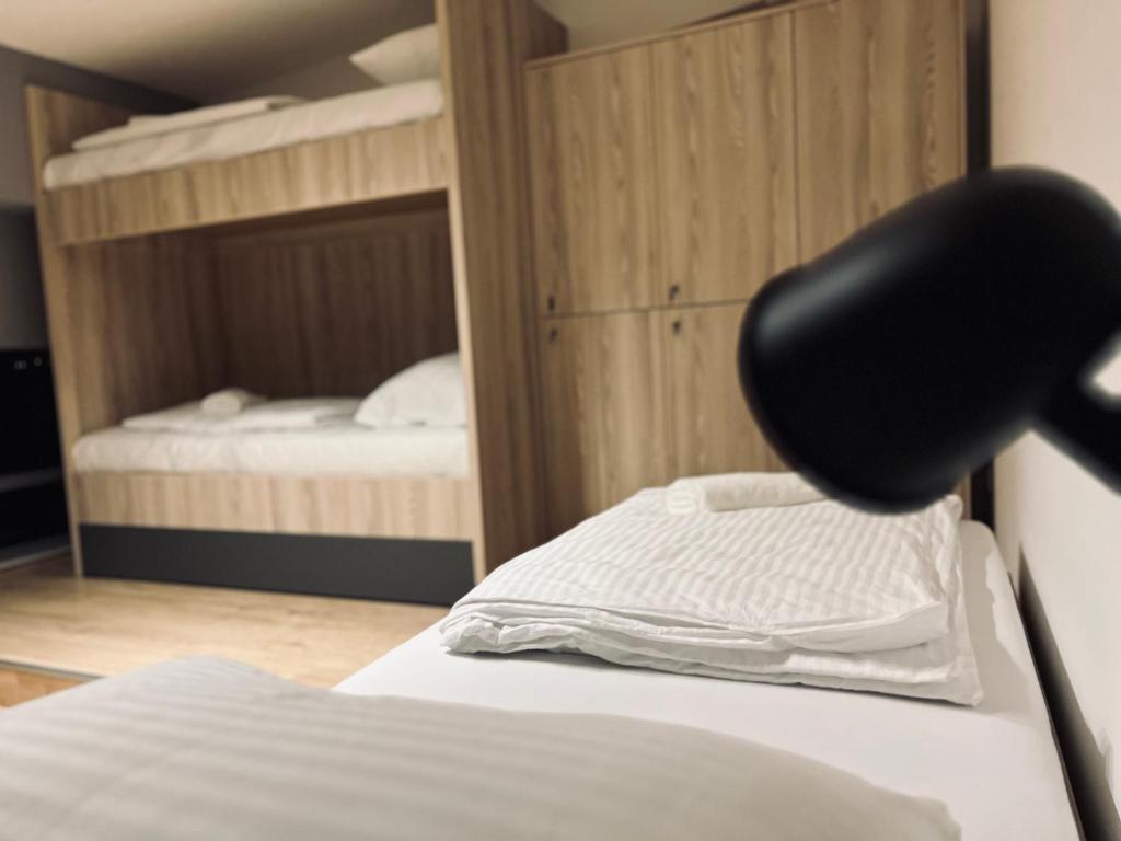 Postel nebo postele na pokoji v ubytování Borsa Rooms