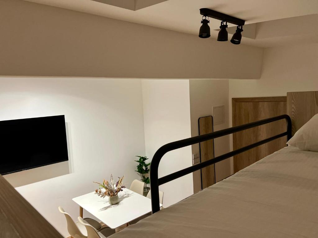 Postel nebo postele na pokoji v ubytování Borsa Rooms