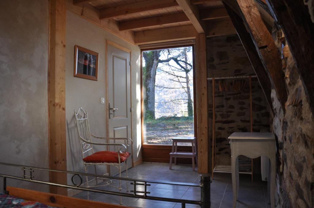Posezení v ubytování Gîte Le Couderc de Coubisou, grange rénovée