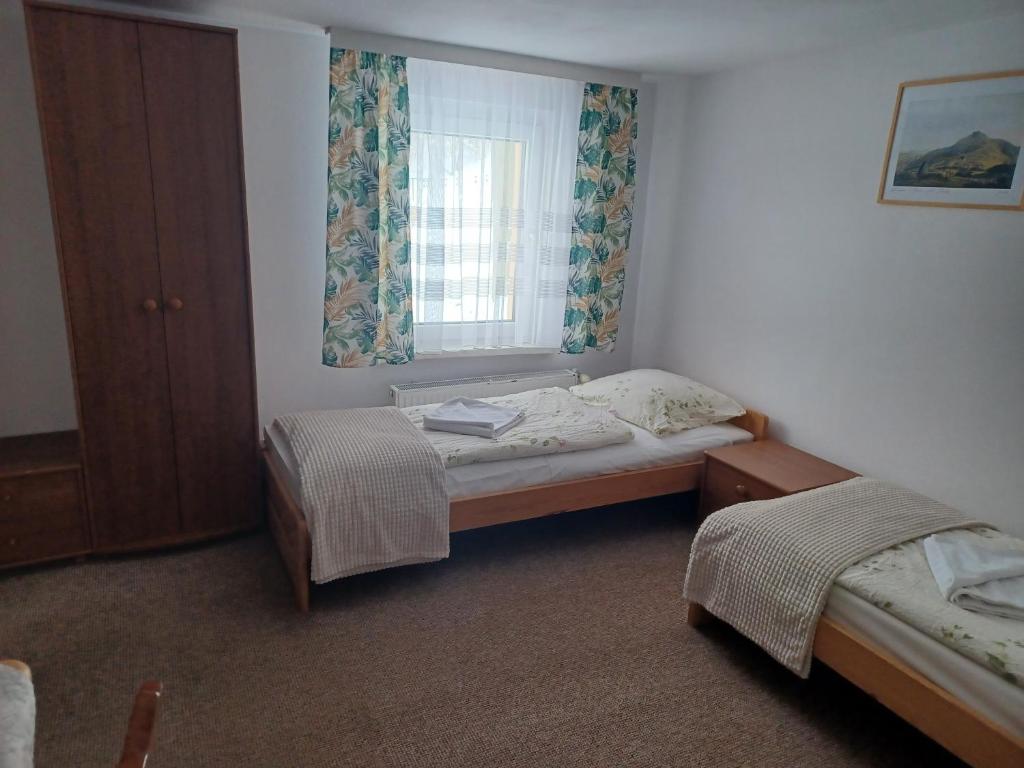 Postel nebo postele na pokoji v ubytování Anna