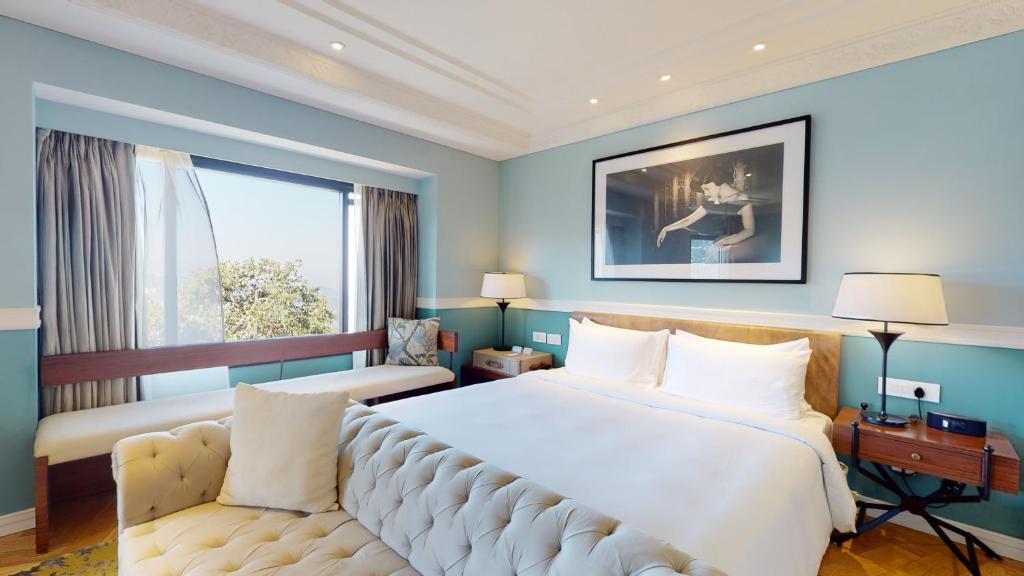 Voodi või voodid majutusasutuse Radisson Hotel Shimla toas