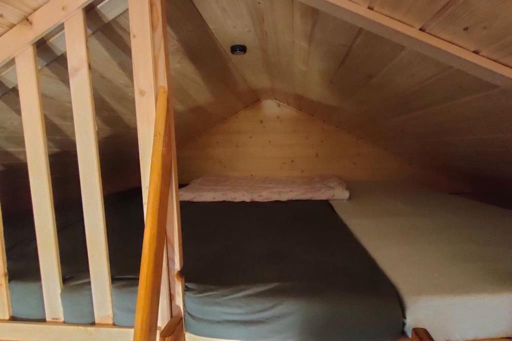 Postel nebo postele na pokoji v ubytování Tiny Treperka