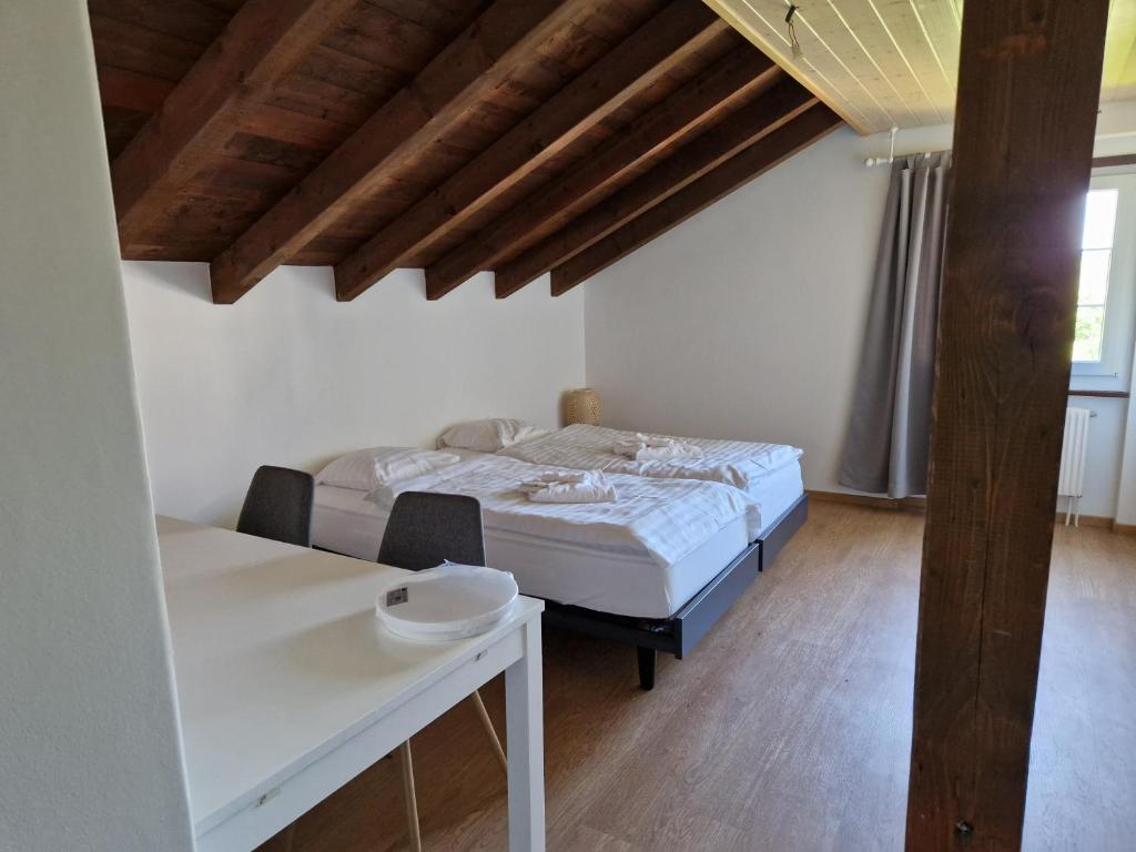 Postel nebo postele na pokoji v ubytování Auberge du Peu-Péquignot