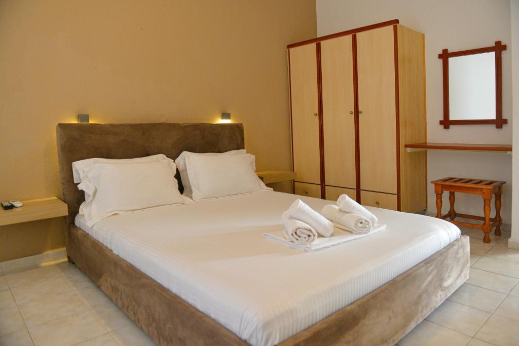 Postel nebo postele na pokoji v ubytování Hotel Marina