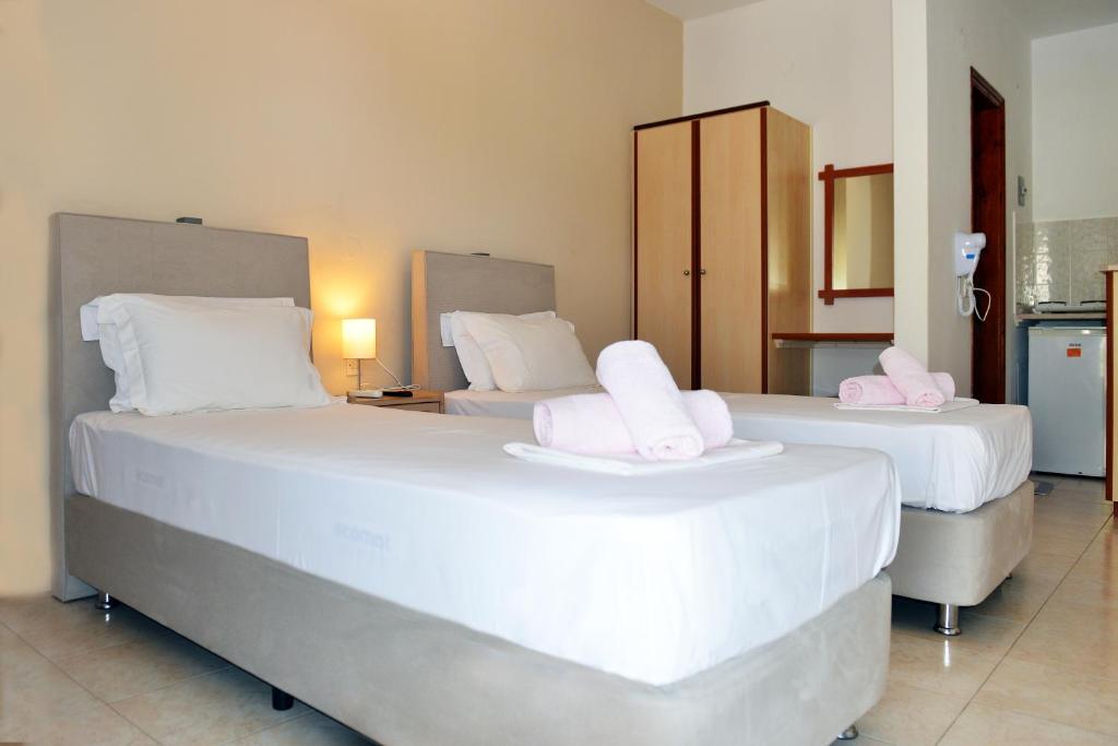 Postel nebo postele na pokoji v ubytování Hotel Marina