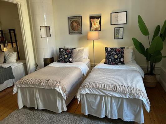 Postel nebo postele na pokoji v ubytování Stockholm Loft Haven 3 Beds in a 1- Bedroom Gem - 917