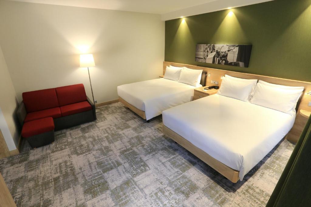 Ein Bett oder Betten in einem Zimmer der Unterkunft Hampton By Hilton Gdansk Old Town