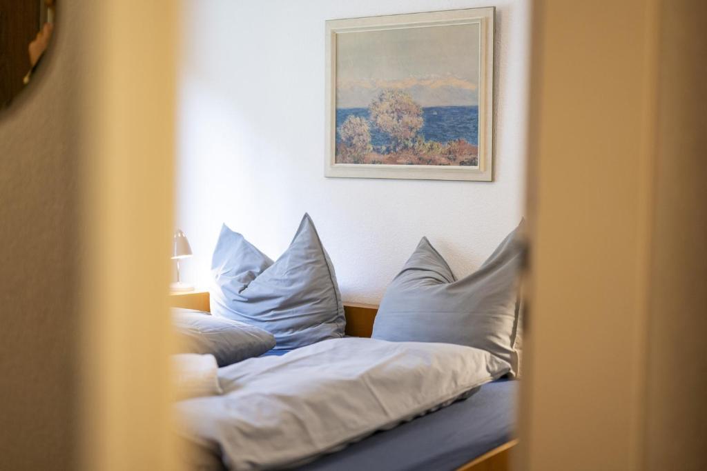 Postel nebo postele na pokoji v ubytování Brentschpark Wohnung 72