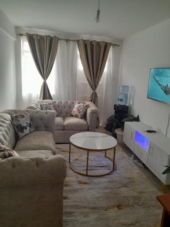 Posezení v ubytování REMA AIRBNB'S