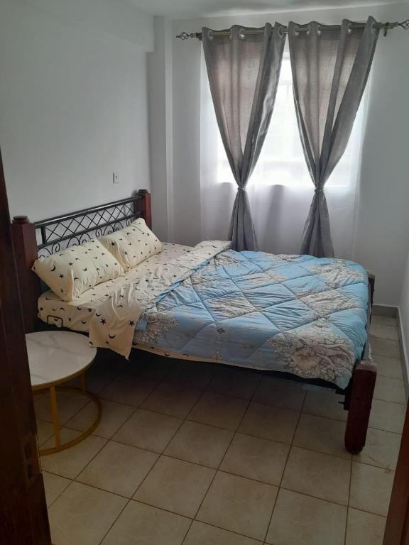 Postel nebo postele na pokoji v ubytování REMA AIRBNB'S
