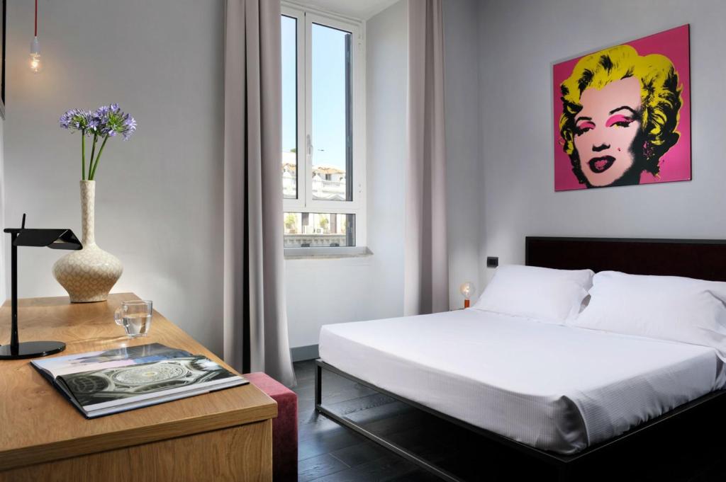 Ένα ή περισσότερα κρεβάτια σε δωμάτιο στο Suite Art Navona