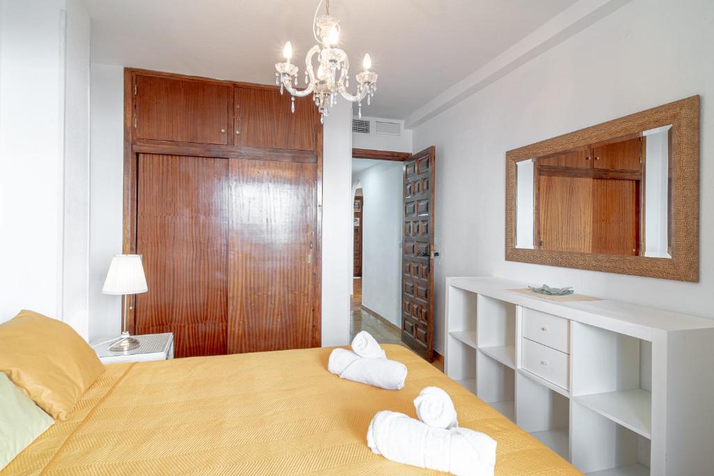 Postel nebo postele na pokoji v ubytování Carabeo II 5 Apartments Casasol