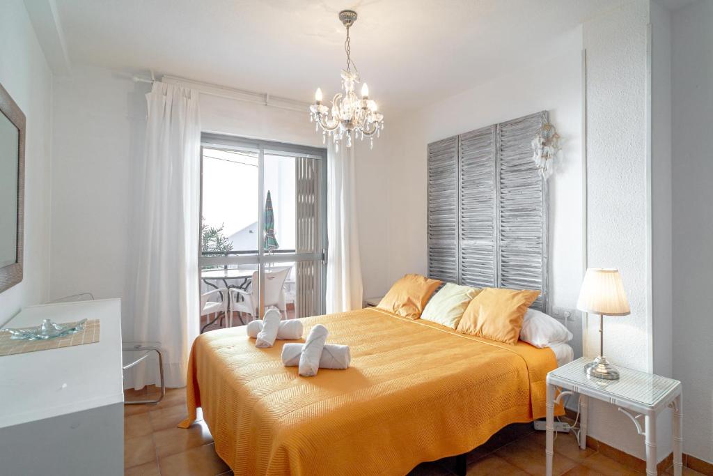 Postel nebo postele na pokoji v ubytování Carabeo II 5 Apartments Casasol