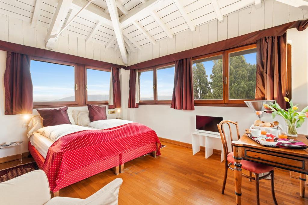 Postel nebo postele na pokoji v ubytování Villa Pambuffetti