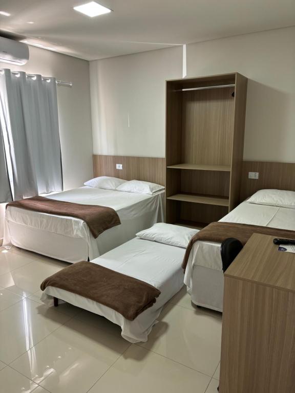 Postel nebo postele na pokoji v ubytování Mahle Hotel