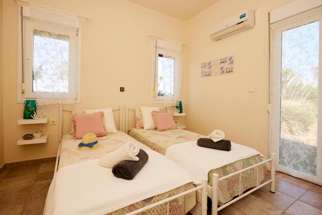 Postel nebo postele na pokoji v ubytování Edem Paradise