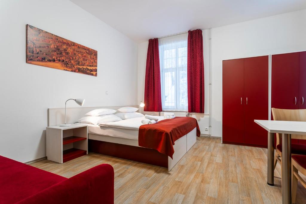 Postel nebo postele na pokoji v ubytování Apartmánový komplex Dagmar