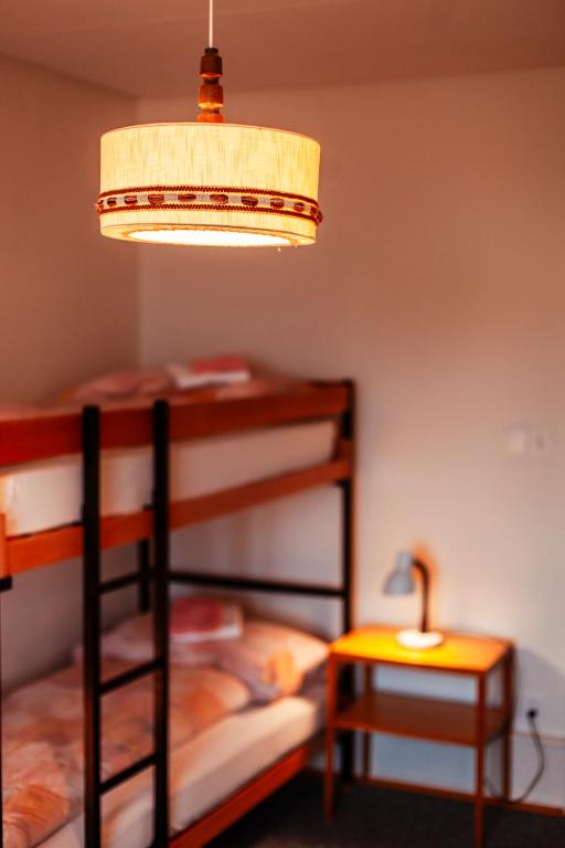Postel nebo postele na pokoji v ubytování Chrischona Berg