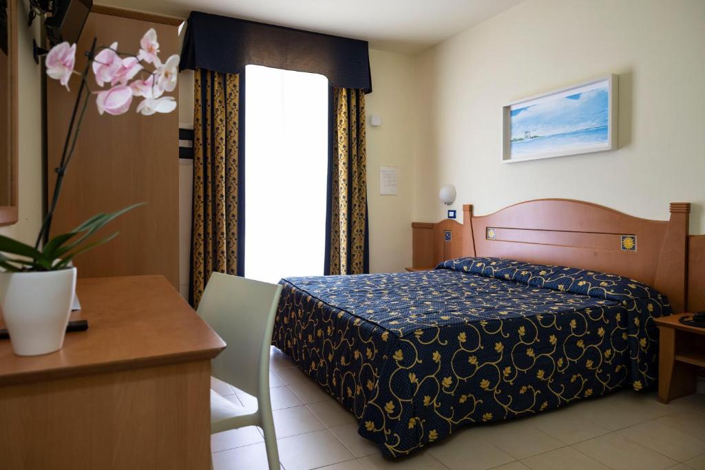 Postel nebo postele na pokoji v ubytování Blu Salento Village