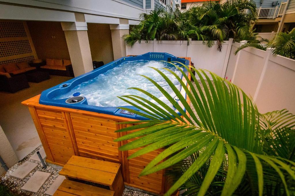 a large jacuzzi tub on top of a building at Tropical Treasure Beach Villa in St. Pete Beach