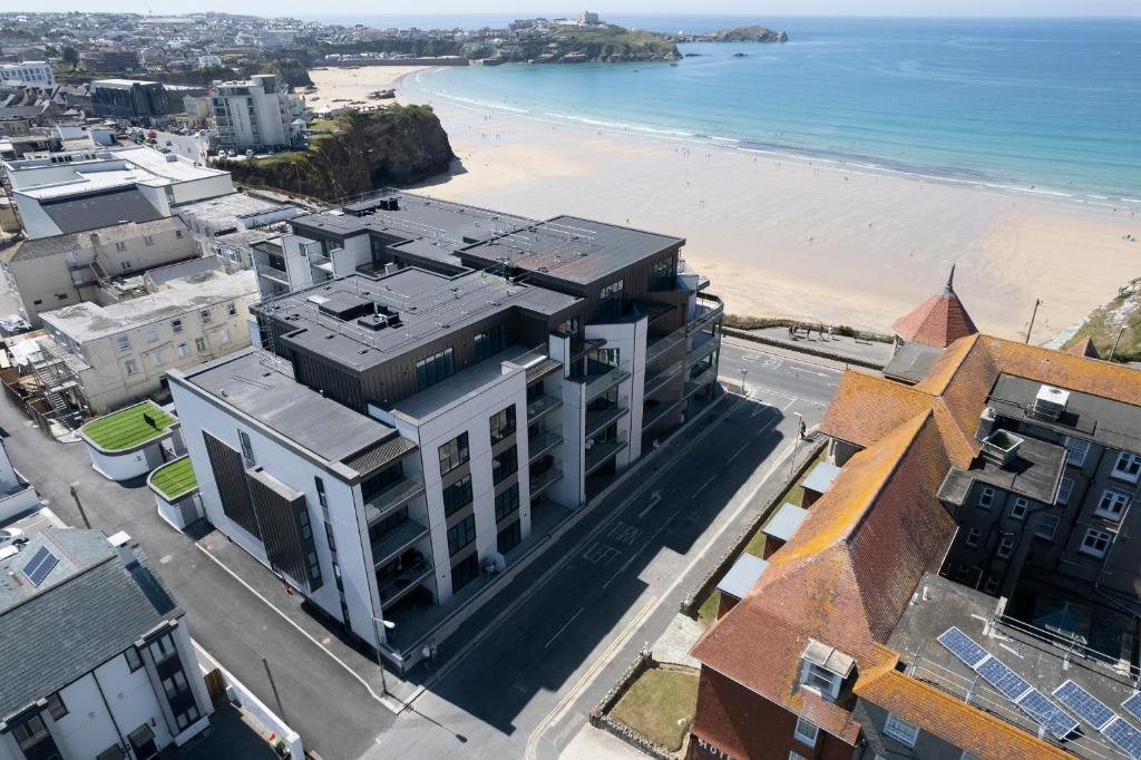 an aerial view of a city with a beach at 31 Cliff Edge in Newquay