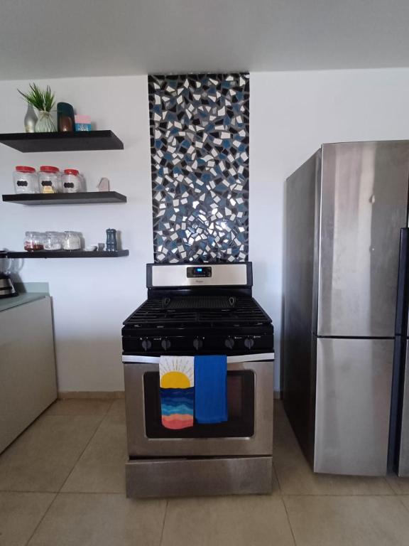 Kuchyň nebo kuchyňský kout v ubytování Coba Lodo Family house